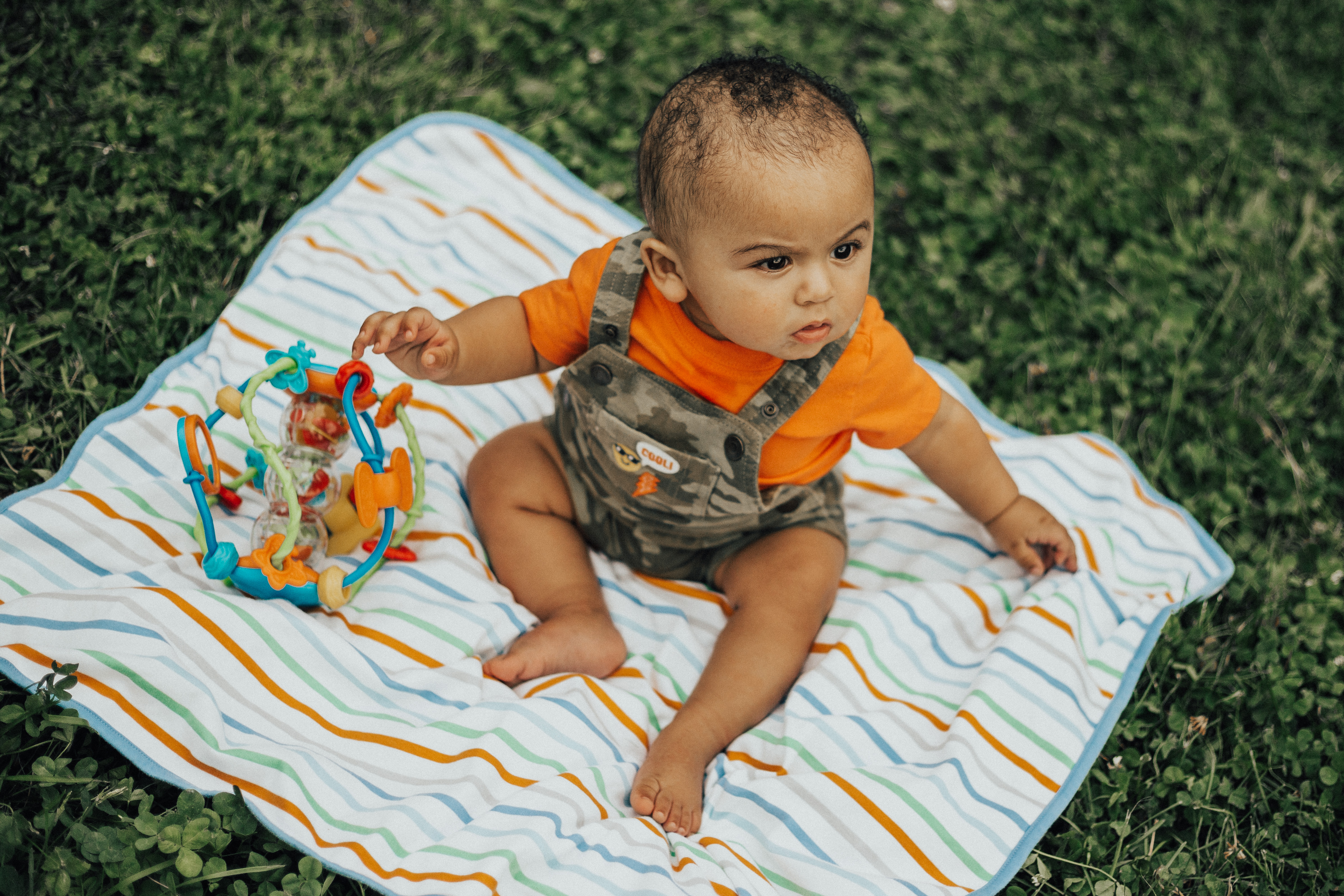 baby with grass